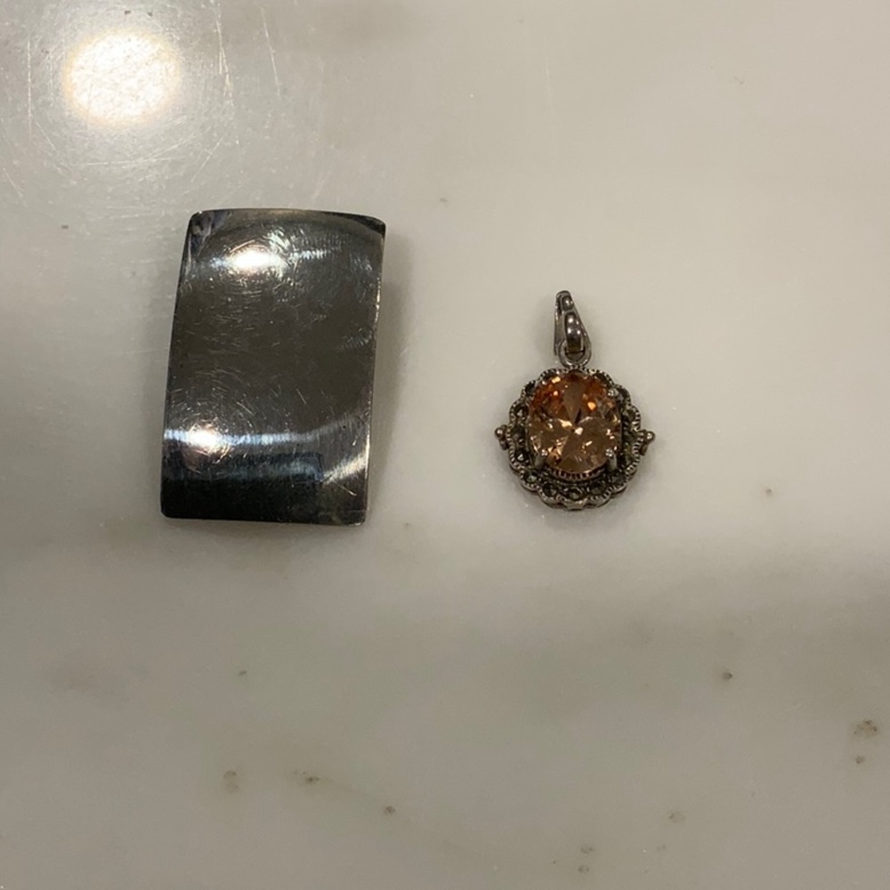 Lot of 2 sterling silver pendants